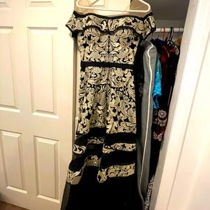 Black and gold dress with short under